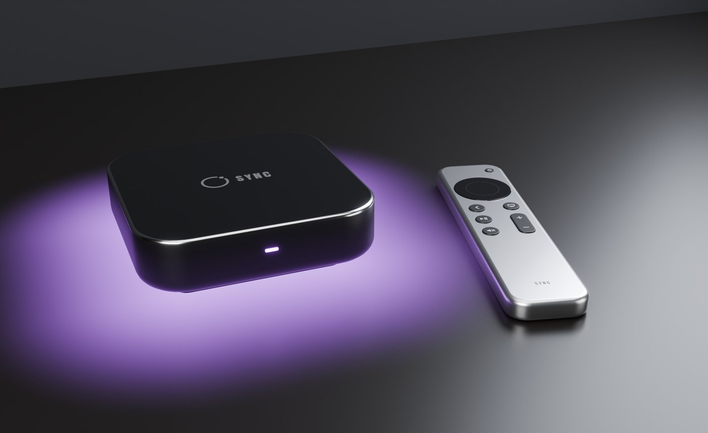 The Sync Box on a dark table, its light strip glowing violet, the Sync Remote beside it