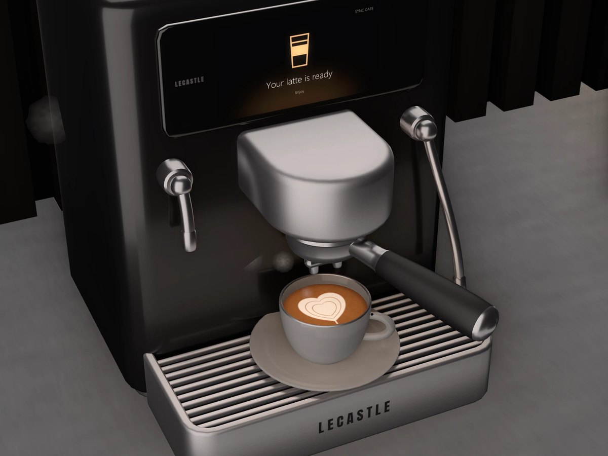 A latte with a heart in the foam, the screen saying Your latte is ready