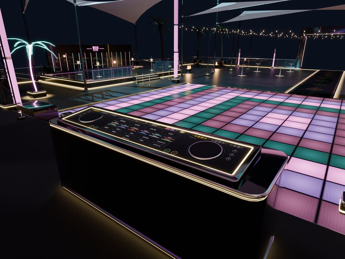The DJ booth's glass console in front of the lit dance floor