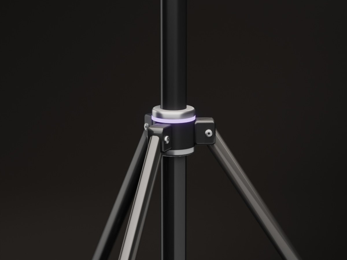 The tripod's hub with its lit band